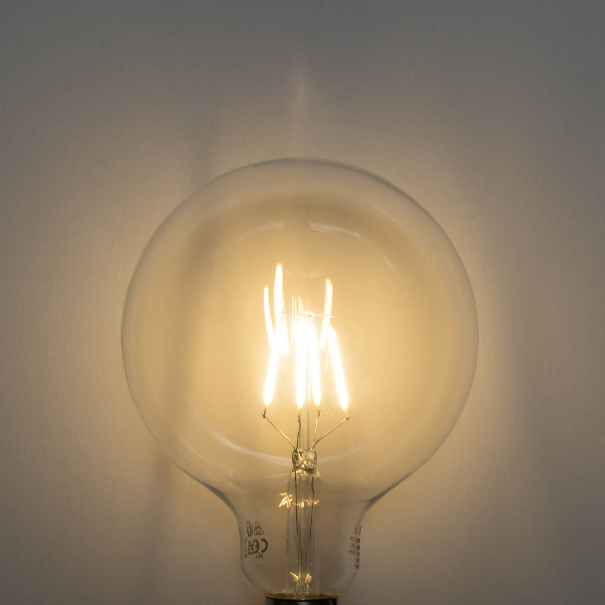 Bombilla LED E27 con filamento espiral regulable en 3 pasos G125 4W 450lm 2700K